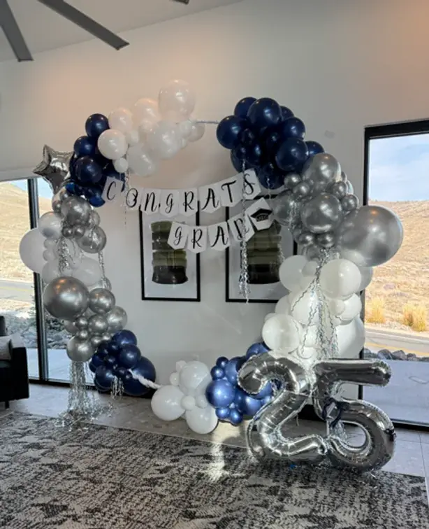 Navy, white, and silver graduation circle arch
